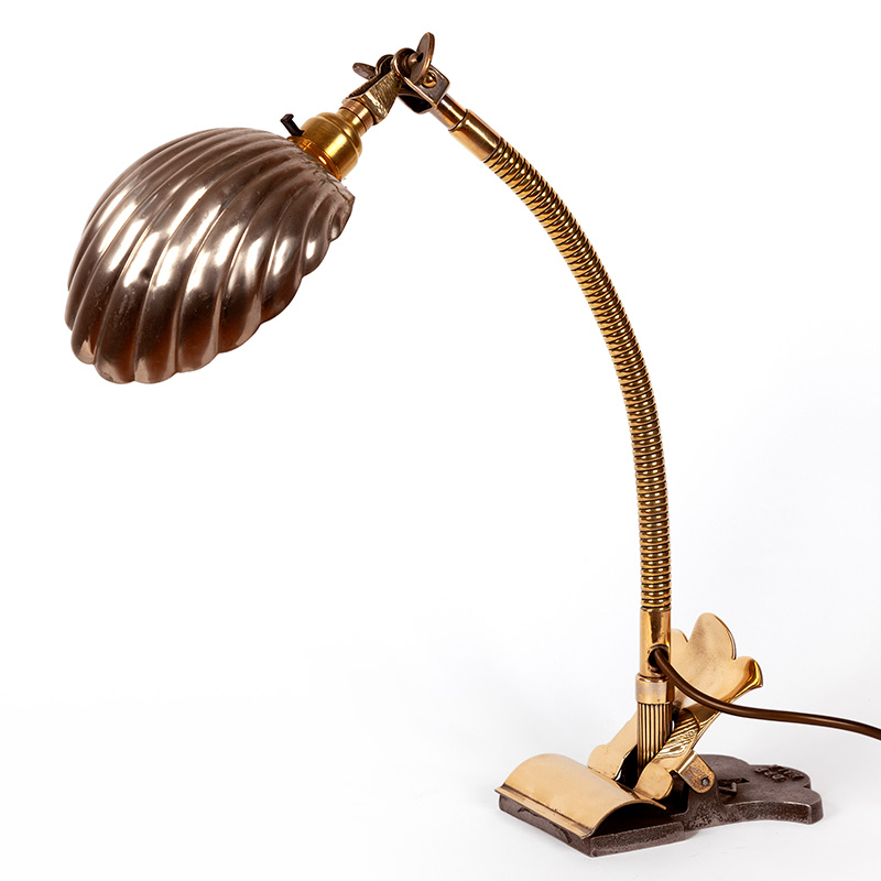 Art Deco brass and chrome desk lamp fitted with a clam shell shade, clamp base and adjustable arm and shade (c.1925).